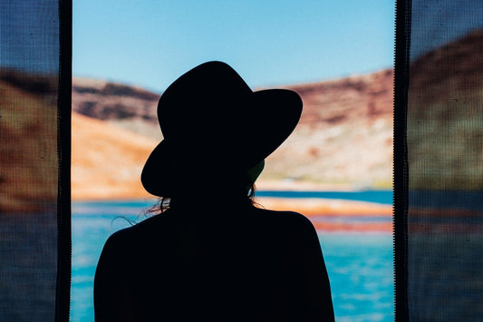 silhouette of woman at mountain