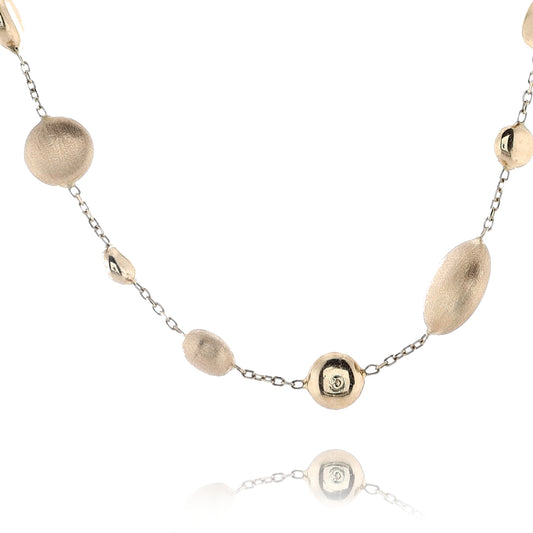 14 Karat Yellow Gold Assorted Round and Puff Matte and Polished Station Bead Necklace