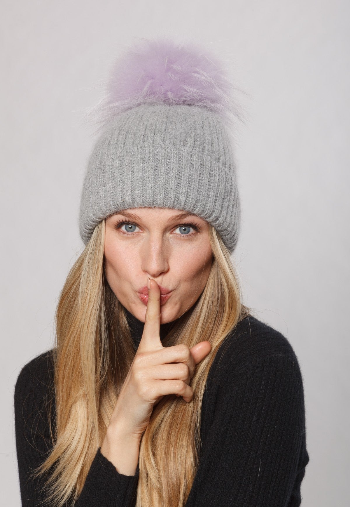 Grey hat fashion with fur pom pom